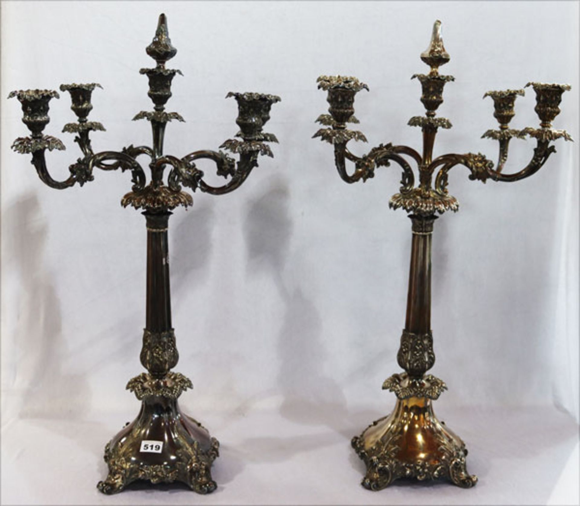 Paar große 5-armige Kerzenleuchter mit reliefiertem Dekor, versilbert, H 81 cm, D 55 cm,