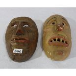 2 Holz Masken, farbig gefaßt, Fassung teils beschädigt, H 24/26 cm, Alters- und Gebrauchsspuren