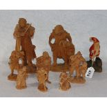Konvolut von 8 diversen Ziebelholzfiguren, H 9/25 cm, und Holzfigur 'Nikolaus', gefaßt