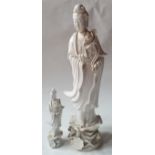 Two Chinese blanc-de-chine figures of Guan Yin, the larger 14.25" high. (2)