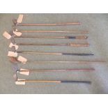 A group of eight early 20thC hickory-shafted golf clubs, including one unmarked example as well as