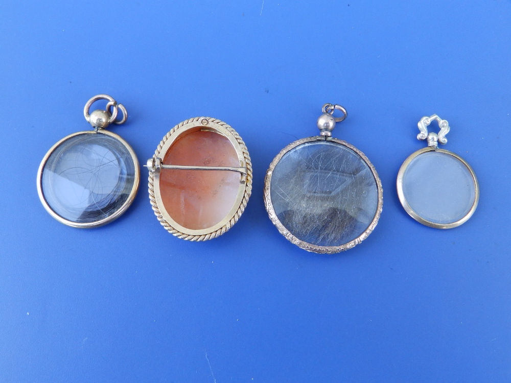 A 9ct cameo brooch/pendant, 1.3" and three circular glazed lockets. (4) - Image 2 of 2
