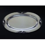 A Georg Jensen oval Sterling silver tray in Blossom pattern 2AA, the border set with four bold