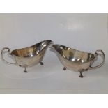 A pair of modern Sheffield silver sauceboats, 6.25" across. (2)