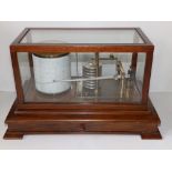 A mahogany cased barograph by Dixey & Son, New Bond Street, with chart drawer to base, 14" across