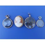 A 9ct cameo brooch/pendant, 1.3" and three circular glazed lockets. (4)