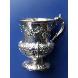 An ornate William IV Barnard Brothers silver cup, having repousse & cast decoration of acorns and