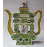 A Chinese famille verte teapot of pagoda form - repairs to lid, 9.5" high.