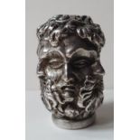 A heavy white metal cane top in the form of conjoined male & female faces. 2.1" high.