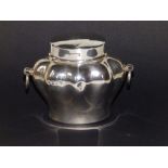 An Edwardian two-handled oval silver tea caddy with detachable cover - London 1902, 4.5" across