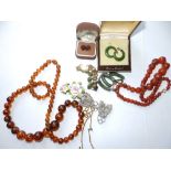 Two imitation amber bead necklaces and a small quantity of costume jewellery