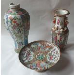 A Chinese famille rose Canton porcelain pedestal dish and two vases, the larger 11.5" high vase a/f.