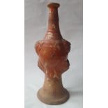 A 17thC pottery flask with marbled glaze, 10.75" high.