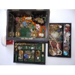 A Victorian leather covered jewellery box & contents.