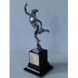 A plated figural trophy depicting Mercury, the base bearing inscriptions dated 1961-1967.