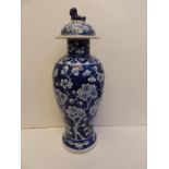 A 19thC Chinese blue & white porcelain covered vase of slender meiping shape, painted with a