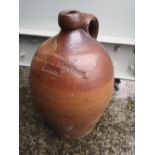 An old stoneware cider jar -'J.J. Coward, Wine & Spirit Merchant, Exeter', 14" high.