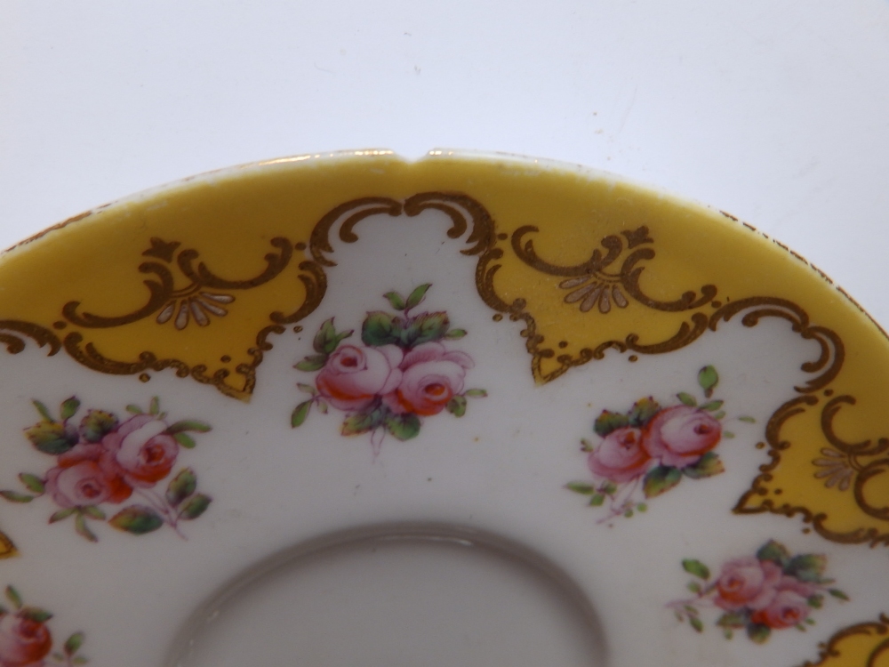 An early 20thC Royal Worcester 19 piece tea set, decorated roses with yellow & gold borders in - Image 9 of 20