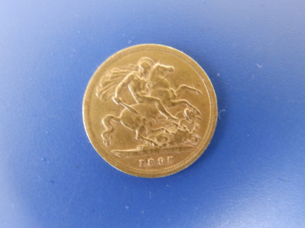 An 1895 gold half sovereign.