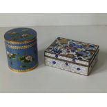 An Oriental cloisonne cigarette box with silver-plated mounts, 4.5" across and a blue ground