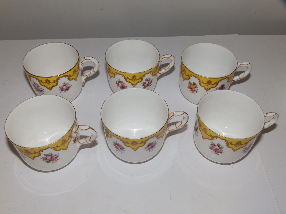 An early 20thC Royal Worcester 19 piece tea set, decorated roses with yellow & gold borders in - Image 4 of 20