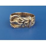 An 18ct gold buckle band ring, Chester marks. Finger size N/O.