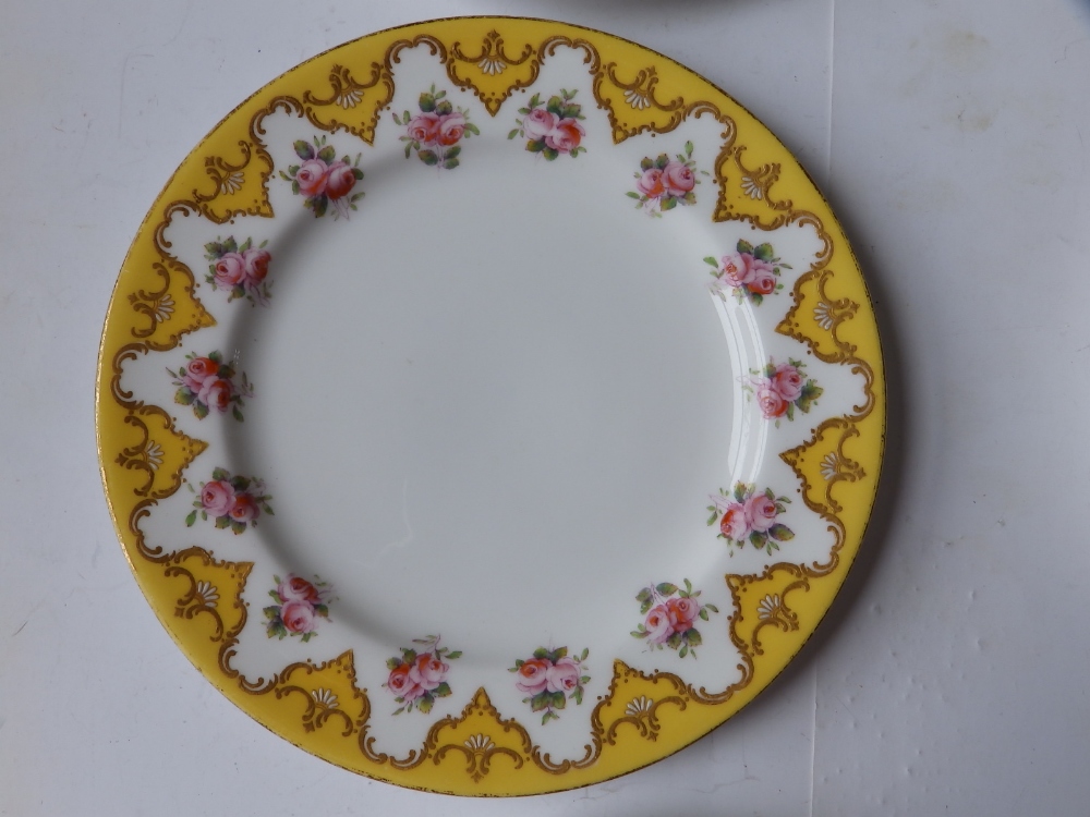 An early 20thC Royal Worcester 19 piece tea set, decorated roses with yellow & gold borders in - Image 16 of 20