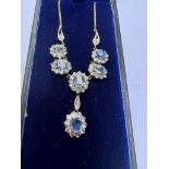 An early 20thC certified natural Sri-Lankan sapphire cluster necklace, comprising six oval
