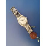 A gent's stainless steel Rolex bracelet wrist watch, Model 16014, fitted with white Datejust dial