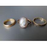 A 22ct wedding ring and two 9ct rings. (3)