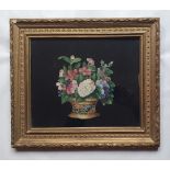 An antique watercolour cut-out - Still life study of flowers in a basket, laid on a black ground, 9"