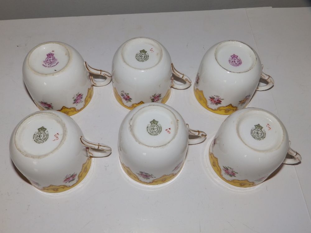 An early 20thC Royal Worcester 19 piece tea set, decorated roses with yellow & gold borders in - Image 5 of 20