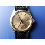 A gent's 14ct gold Rolex Oyster Perpetual Date wrist watch with gold dial & baton markers, 33mm