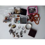 A quantity of silver, amber and other costume jewellery.