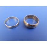 Two 18ct gold wedding rings.