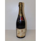 A bottle of vintage Moet & Chandon champagne.