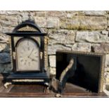 A 19thC ormolu mounted ebonised chiming bracket clock with bracket, the arched dial with strike/