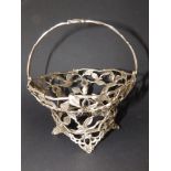 An early Victorian silver openwork swing-handled sweetmeat basket frame, formed as leafy