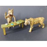 An Austrian cold-painted bronze figure of a fox croupier, 4.25" across , together with a tiger, 4.1"