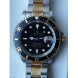 A boxed gent's gold & stainless steel Rolex Oyster Perpetual Date Submariner Model 16613, having