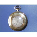 An early 20thC Swiss 18ct gold slimline case pocket watch, lion crest to back of case,