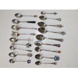 17 crested & other silver/sterling teaspoons and a small Birmingham silver pickle fork. (18)