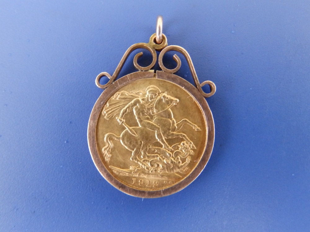 A 1912 gold sovereign in pendant mount.