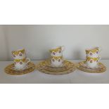 An early 20thC Royal Worcester 19 piece tea set, decorated roses with yellow & gold borders in