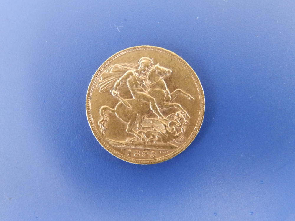 An 1893 gold sovereign.