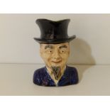 A Victorian majolica Abraham Lincoln character jug, 6" high.