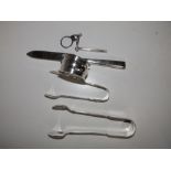 A Birmingham silver toothpick on key ring, a silver napkin ring, two pairs of silver sugar tongs and