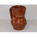 A 19thC Spanish earthenware jug - 'AP Barcelona, Boolega Calella', 7" high.
