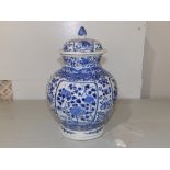 A 19thC Chinese blue & white porcelain covered vase, 8.75" high - damaged.