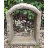 An early stone round-arch window frame, carved from a single block of limestone, 27.5" x 21".